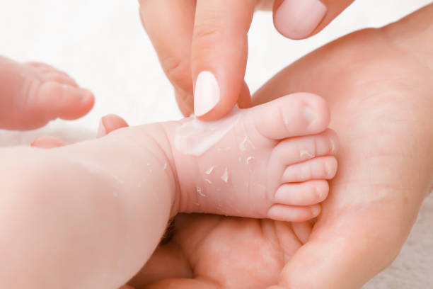 Dry Skin in Babies When we think of a baby's skin we usually think of soft smooth and elastic skin. But baby skin has many more things that make baby skin sensitive like irritation rash dryness etc. Especially the dryness of the baby is harmful for the baby's skin. We will discuss some of the causes of dry skin. Causes of Dry Skin: The best way to deal with baby dry skin is to take care and treat it thoroughly. Let us know the causes of baby skin dryness: Vernix Caseosa: Usually, parents think that the baby's skin is dry only in the first days of the baby's birth. But this is not entirely true. 75% of newborns experience very noticeable peeling of the skin in the first days of life, but this does not mean that your baby's skin is dry. This is because within a few hours of birth the vernix dries out, the substance that covers the baby's skin at birth. This in turn leads to the underlying skin which is characteristically dry. It is very normal after birth and disappears without needing care. Inadeqate Bathrooms: Bathing too frequently or using soaps that are not recommended for baby skin can increase the dryness of the baby's skin. Climate change: Weather is one factor that can cause dry skin in babies. Environmental climate change and dry environment can dehydrate the skin and cause it to peel. Baby Hydration: Keeping your baby well hydrated is important to avoid dry skin. The World Health Organization (WHO) recommends exclusive breastfeeding for the first six months of life. From six months onwards it is better to introduce water feeding along with solid food.