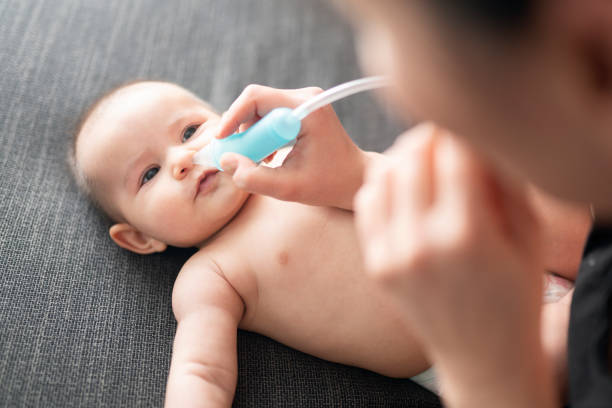 How to Wash your Baby Nasal: It is common for babies to have a cold or stuffy nose from birth. Nasal irrigation is a great way to remove excess fluid and mucus. Reduces nasal congestion and likewise helps prevent complications. Such as rhinosinusitis and ear sluices that can trigger Otitis media. That is why it is important to know how to care for or wash children's nose. Saline solution or specially formulated seawater solution should be used for nasal irrigation of children. Next we will see when and how to wash a young child's nose. When should a child's nose be washed?: Gentle nasal washing can be done as part of a daily hygiene regimen. Especially if the child is prone to ear infections or colds. However, the best time to give the baby's nose is when the baby has nasal congestion or excess mucus and the nose is blocked. Because it will help to remove excess mucus from the baby and relieve the baby's symptoms. What time of the day they should be done depends entirely on the family routine. But the most comfortable time is to wash the nose after bathing and before going to sleep. Although this can be repeated two to three times a day. If this can done about 30 minutes before the child goes to bed, their nasal congestion is relieved and they can rest well. Steps to follow correct nasal washing: Although it can be very complicated and stressful for both the baby and you, following some basic guidelines makes blowing the baby's nose easier. Once you incorporate it into your daily routine, it becomes easier for both the child and the parent. How to do a nasal wash on a newborn baby: If the baby is less than three months of age, the best course of action is to rinse the nose with a single dose of physiological saline. First very carefully clean one nostril and then the other. Babies usually don't accumulate much mucus in the first months, but if the mucus is high and thick, you should see a pediatrician if you can't drain it completely. How to do a nasal wash with syringes or nasal spray: A needle-free and saline solution can be used to clean the nose in babies older than three months and in younger children. Or you can use a nasal spray with a seawater solution to wash children's noses. When you use a syringe or other nasal spray, be careful not to apply too much pressure to children or fear of infection. Follow the next steps:. 1. Place the baby on his stomach while washing the baby's nose. If the baby is a little older, they can be seated with their head tilted. 2. Apply Serum in upward nostrils with light and constant pressure and be careful If you do it with a syringe because it's easy to reach high pressure without realizing it 3. Some discharges will be expelled through the same or other games and some will be surrounded. There is no reason for you to worry because the discharge that the baby swallows naturally does not make any sense. 4. When cleaning the baby's nostrils, the baby's head should be turned to the other side. The child should not feel upset and likewise the second or the nasal should be cleared. Finally at the same time both the nostrils should not be closed. Do not start the second puff until the first one is clear, and if the baby's nose is very blocked, consult a pediatrician without applying too much pressure. How many times is it recommended do rinse the baby's nose: Usually once a day is enough to remove excess mucus and clean the baby's nose. If the baby has trouble sleeping and breastfeeding for Excessive mucus , you can continue the same process several times. But keep in mind that washing the nose too often can irritate the baby's nose and nasal mucus. What are the nasal passages for: At the moment of birth, the respiratory system begins to draw air into the lungs from the first breath. But this airflow must meet specific characteristics of direction, speed, volume, temperature and humidity. All these functions are performed by and responsible for the nose and nasal passages. 1. Air prevents and filters harmful particles from reaching the lungs. 2. Keep inspired air at approximately 31°C so that it reaches the lungs at approximately 37°C. 3. Humidify inspired air so that it reaches 95% relative humidity.